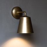 Antique Brass Richmond Medium Wall Light on Grey Background